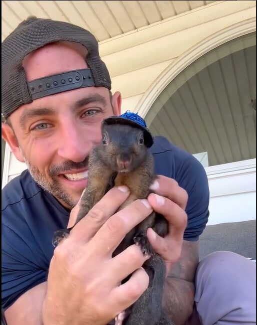 Peanut the squirrel and his owner Mark Longo